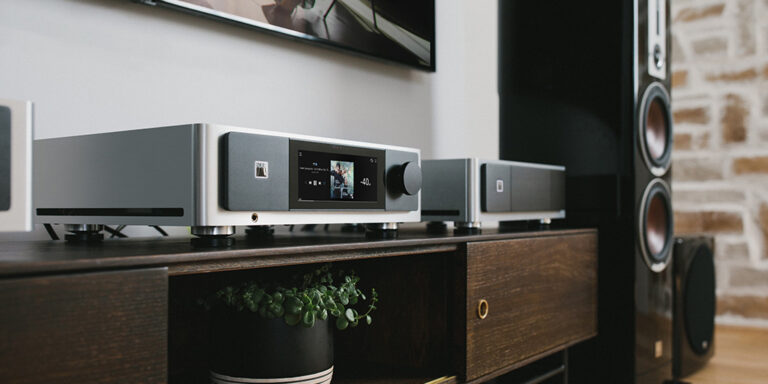 NAD_M66_M23_on_Credenza_Dali_Towers_BLK_PSB_Sub-Side_View-White_Room-1024x512